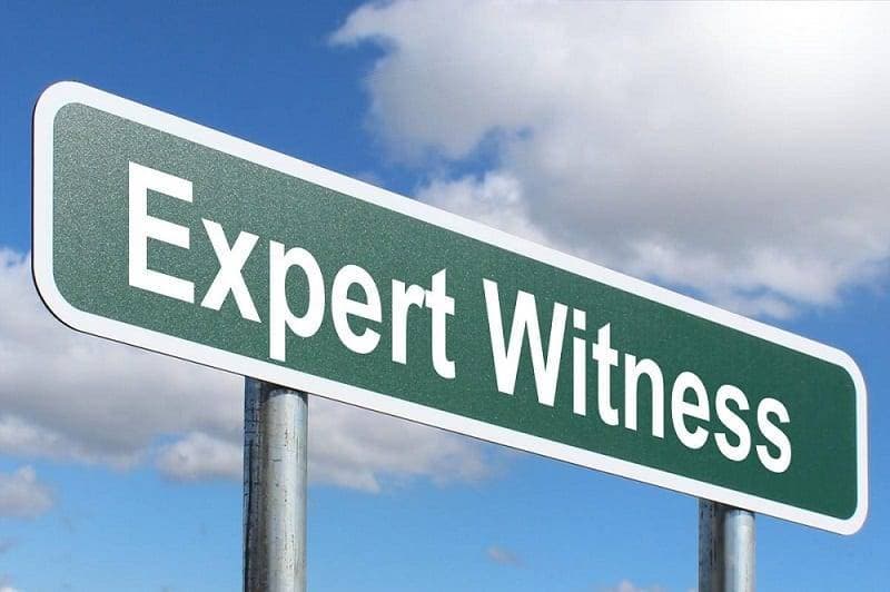 Expert Witness written on a sign board