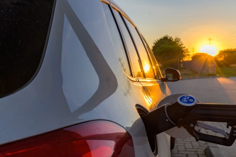 Car Gas Up During Sunset