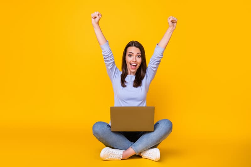 Happy girl with laptop