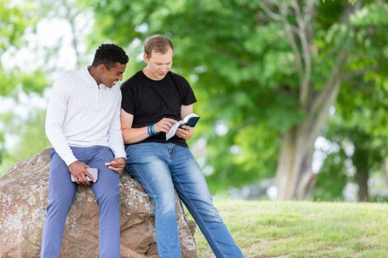 Friends studying the bible together