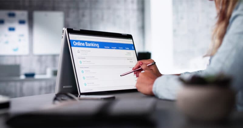 Close-up of a woman looking at the online bank account statement