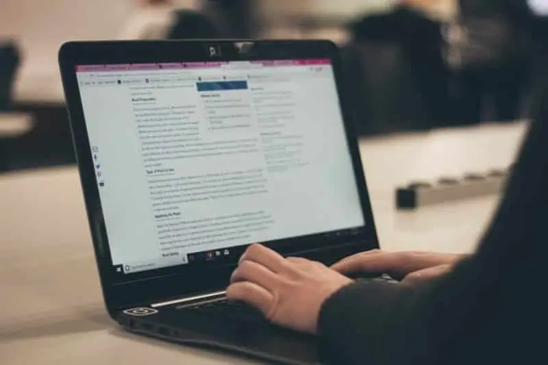 Man blogging on a laptop