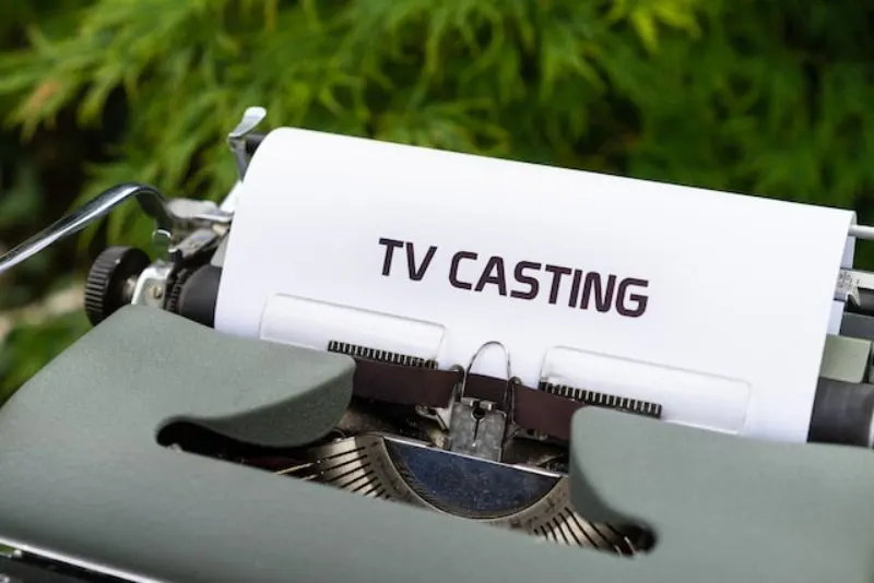 a typewriter printing tv casting page