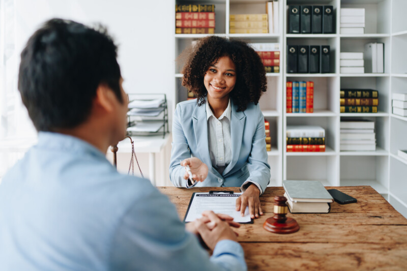 Female attorney talking to a client 